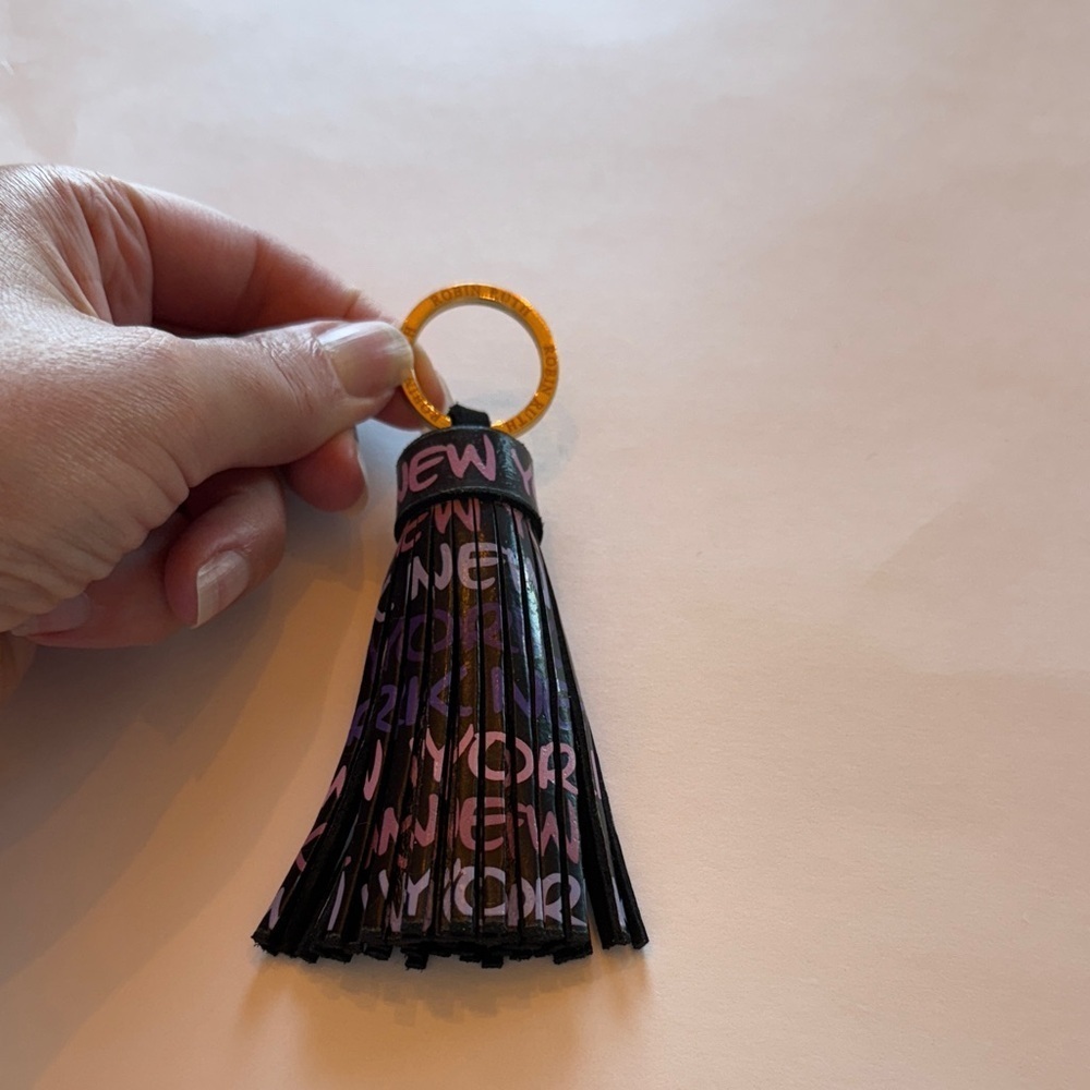Robin Ruth Stylish New York Black and Pink Tassel Key Holder